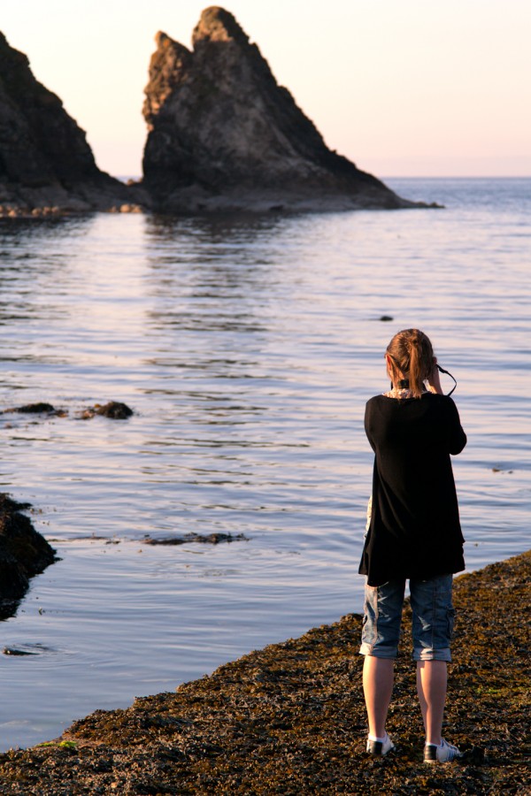 Taking a picture of Lauren, taking a picture of a seal.